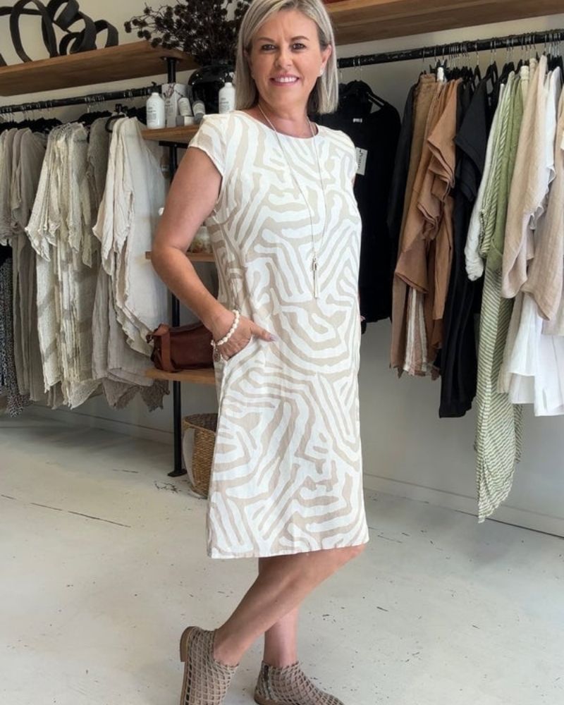 Althea | Flowy midi dress with side pockets