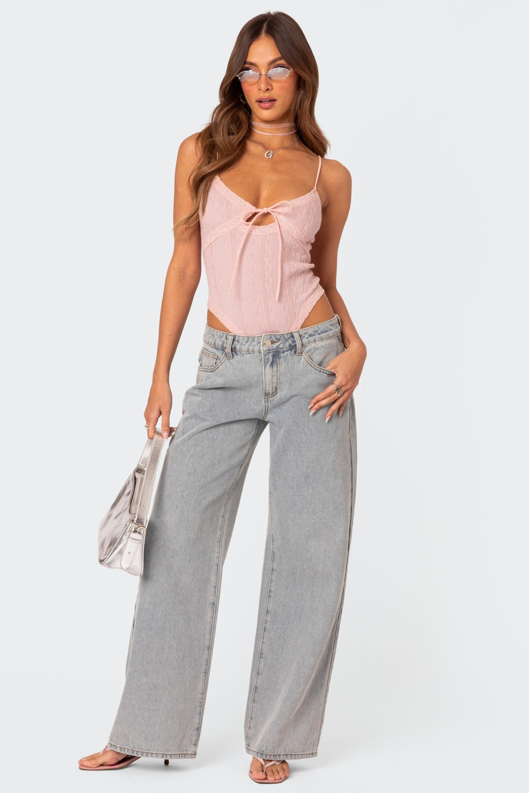Delviana | Signature High-Waist Jeans with Bow Tie Detail