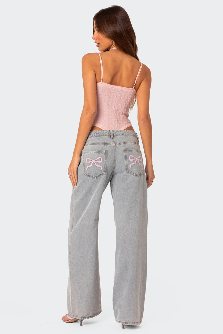 Delviana | Signature High-Waist Jeans with Bow Tie Detail